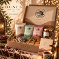 Dunes Ramadan Gift Box with Arabic coffee, chai, hibiscus and date sweets in warm sunlit Middle Eastern-inspired styling